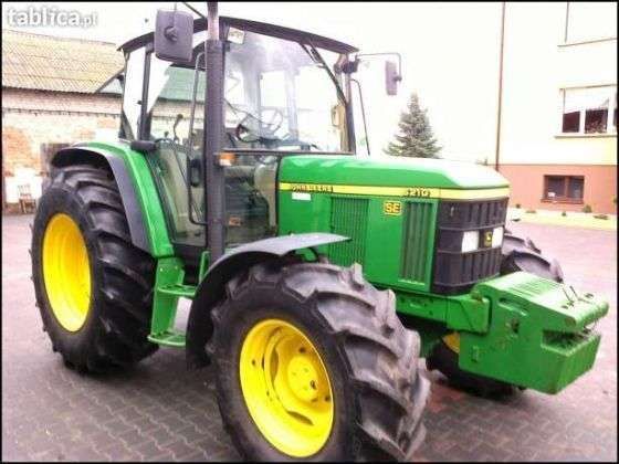 Ciągnik John Deere 6210 z przodu z obciążnikami przednimi 2002