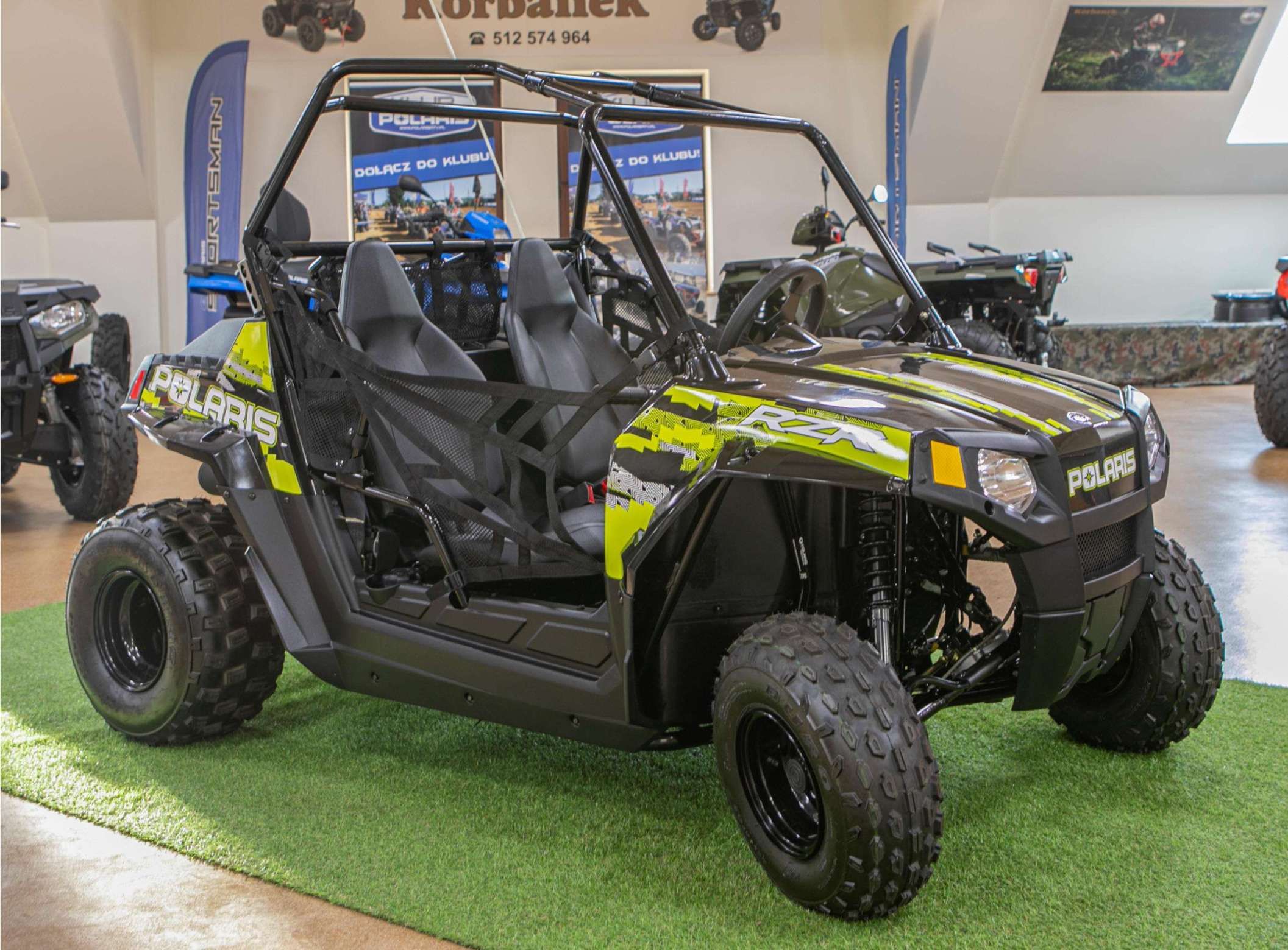 lewy przód pojazd quad Polaris atv RZR 170 czterokołowy dwuosobowy czarno seledynowy