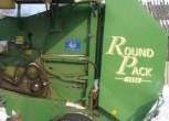 używana prasa zwijająca Krone Round Pack 1550 2000 r podniesiona lewa osłona