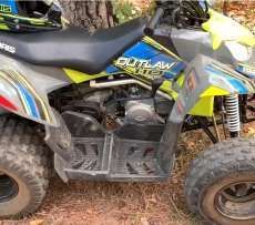 Quad firmy Polaris atv seria Outlaw 110 wersja seledynowa dziecięca