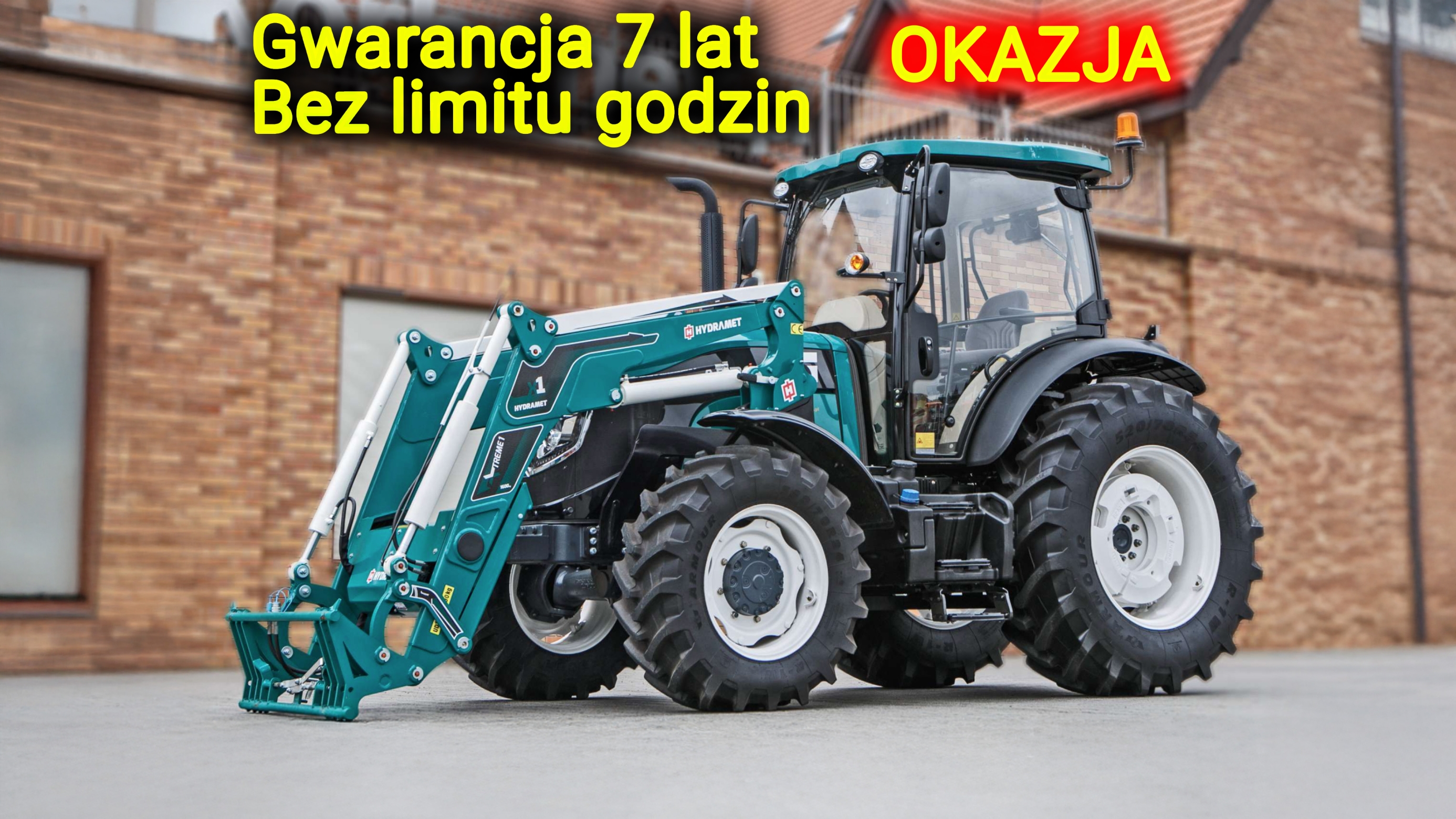 Ciągnik rolniczy Arbos 4100 z ładowaczem widok przodu z lewej strony