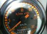 Informacja o motogodzinach ciągnika Renault 110.54 pokazana na wskaźniku 