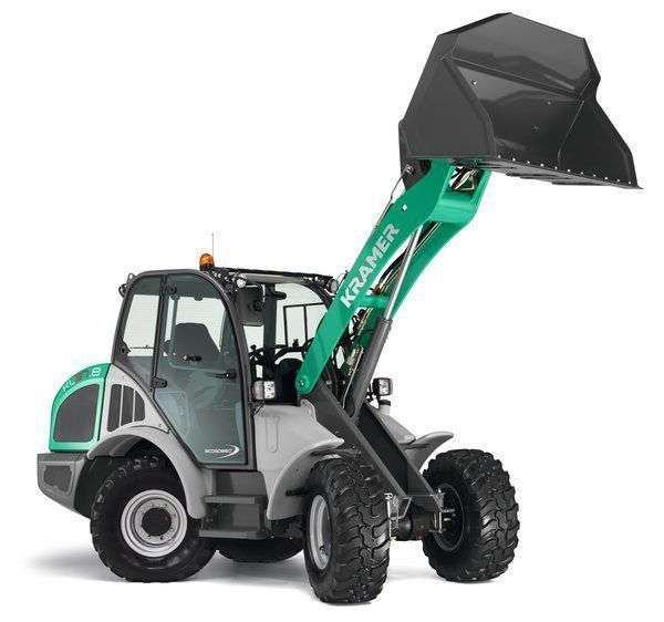 Ładowarka Kramer KL 37.8 z zamontowaną łyżką do materiałów sypkich Ładowarka Kramer KL 37.8 z zamontowaną łyżką do materiałów sypkich uniesioną wysoko w górę