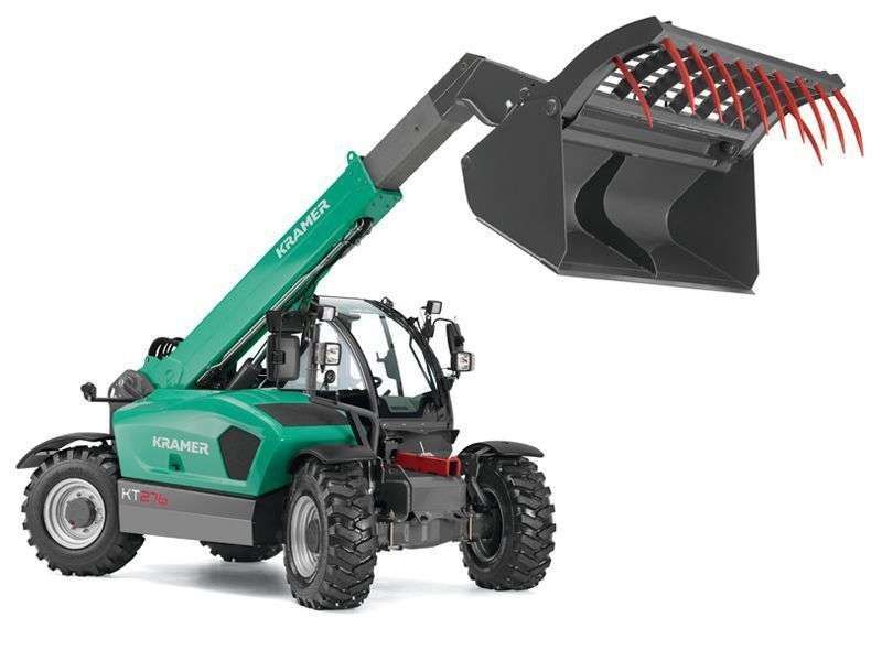 Ładowarka Kramer KT 276 z wydłamy typu krokodyl z oferty firmy Korbanek Niemiecka zielona ładowarka Kramer KT 276 wyposażona w widły typu krokodyl uniesione wysoko z oferty www.korbanek.pl